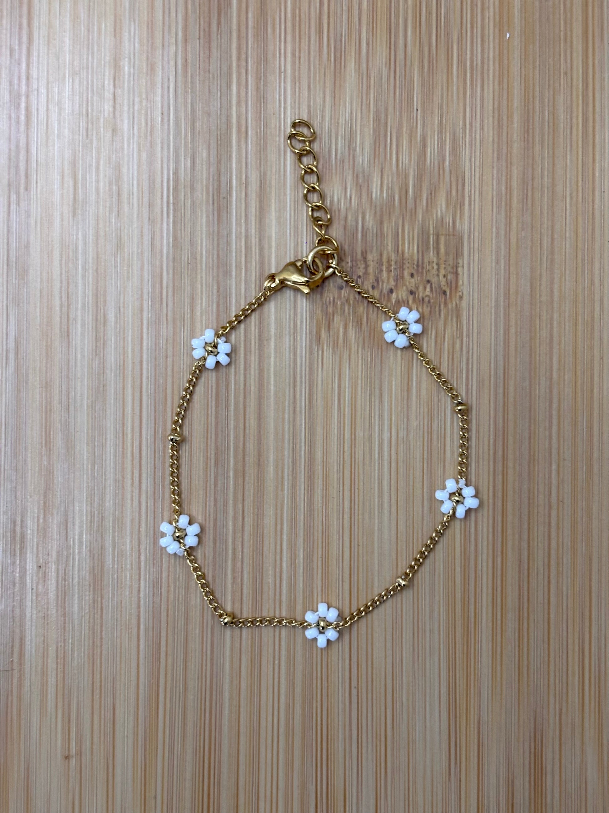 Bloemen armband goud - kleur