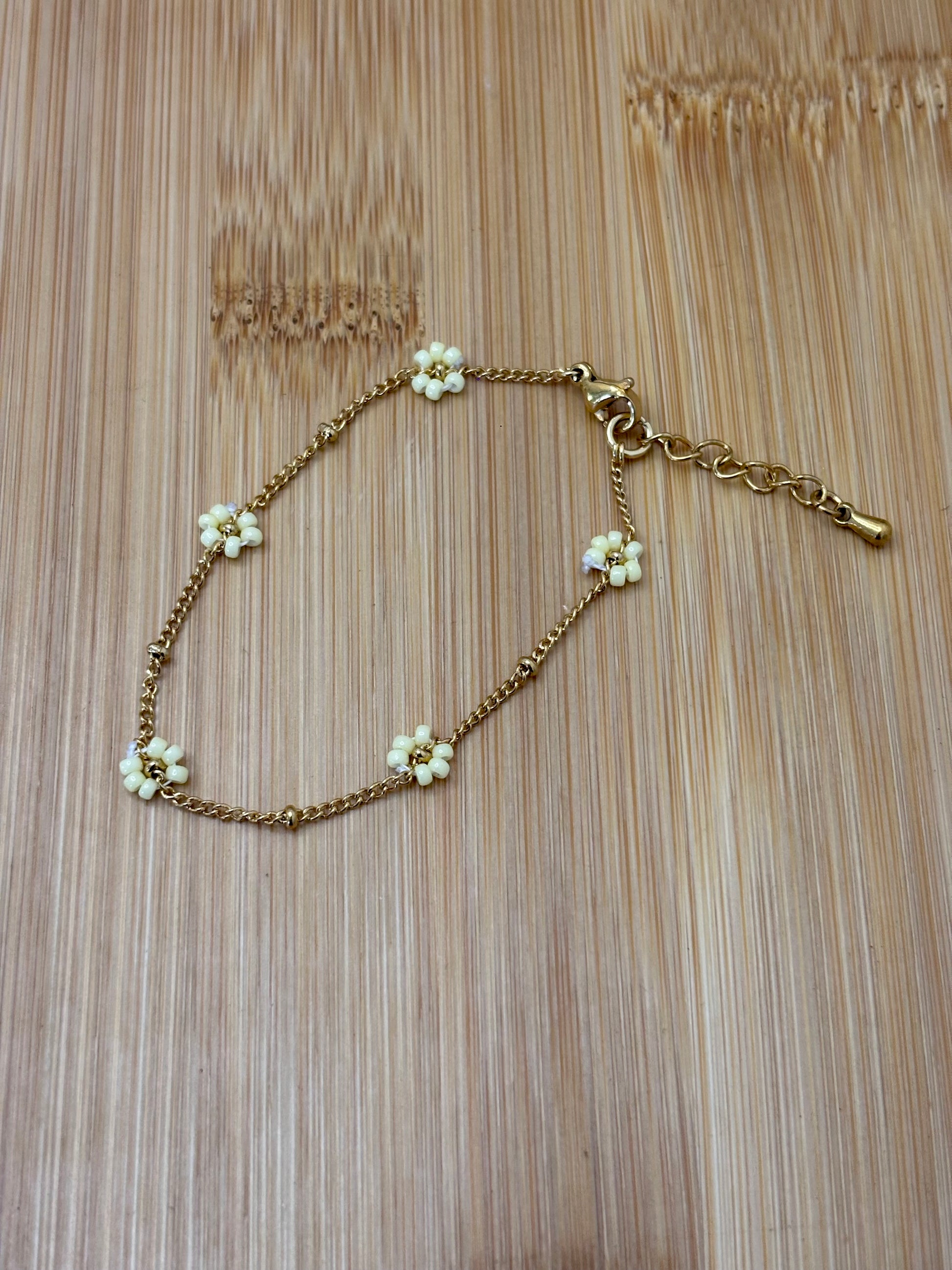 Bloemen armband goud - kleur
