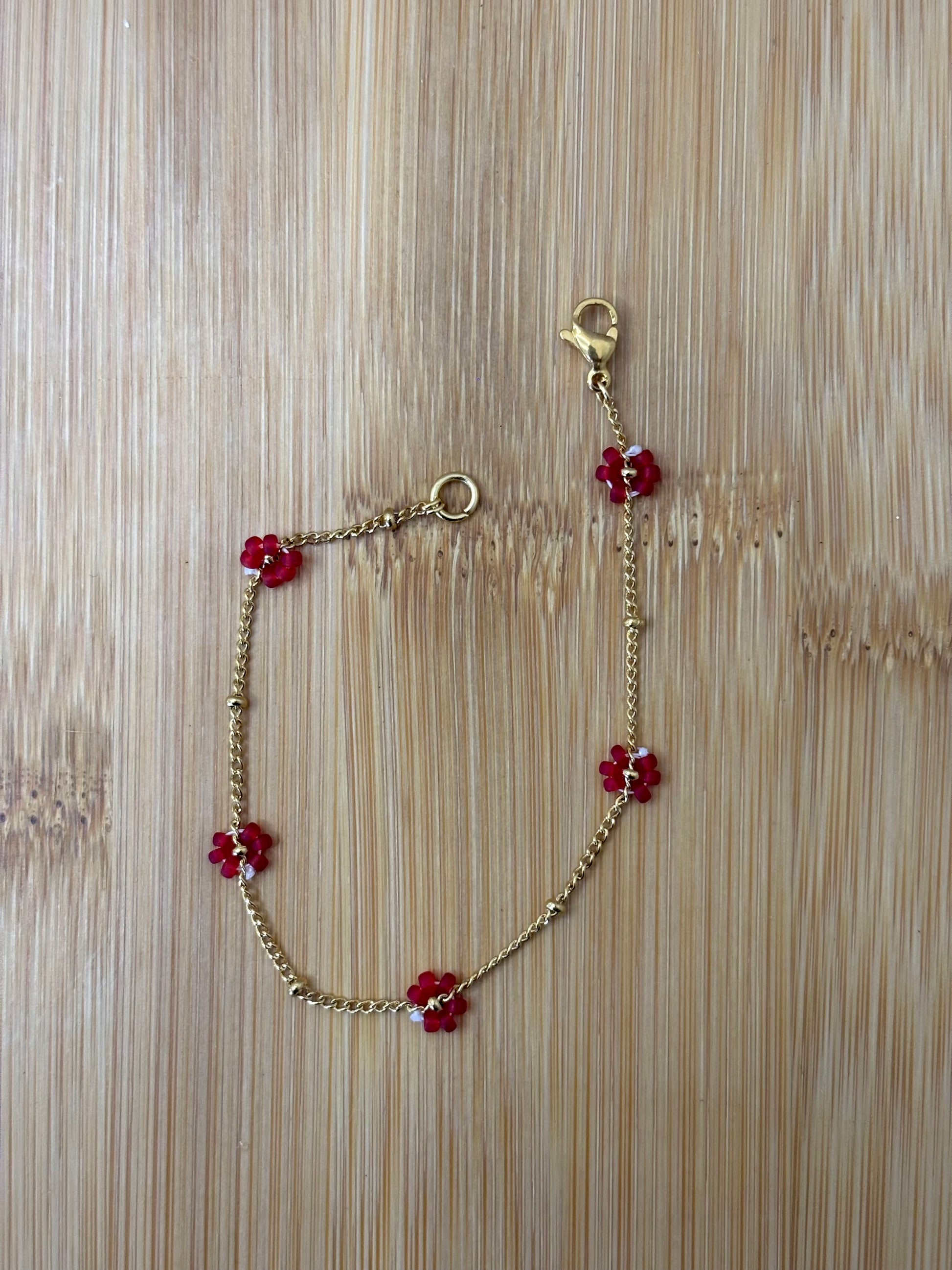Bloemen armband goud - kleur