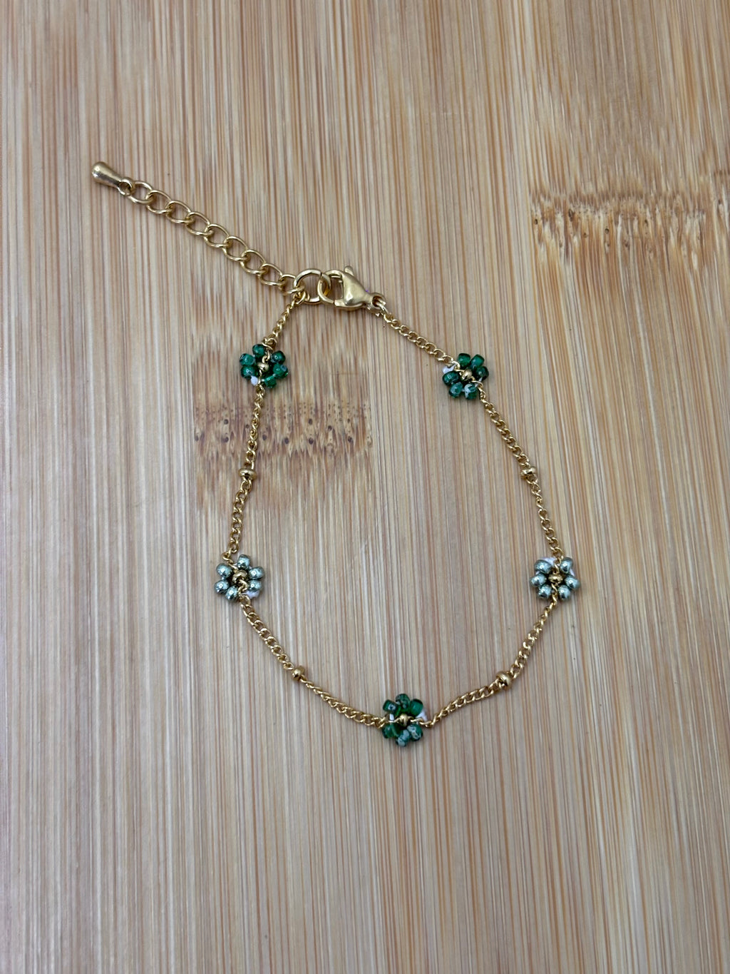 Bloemen armband goud - kleur