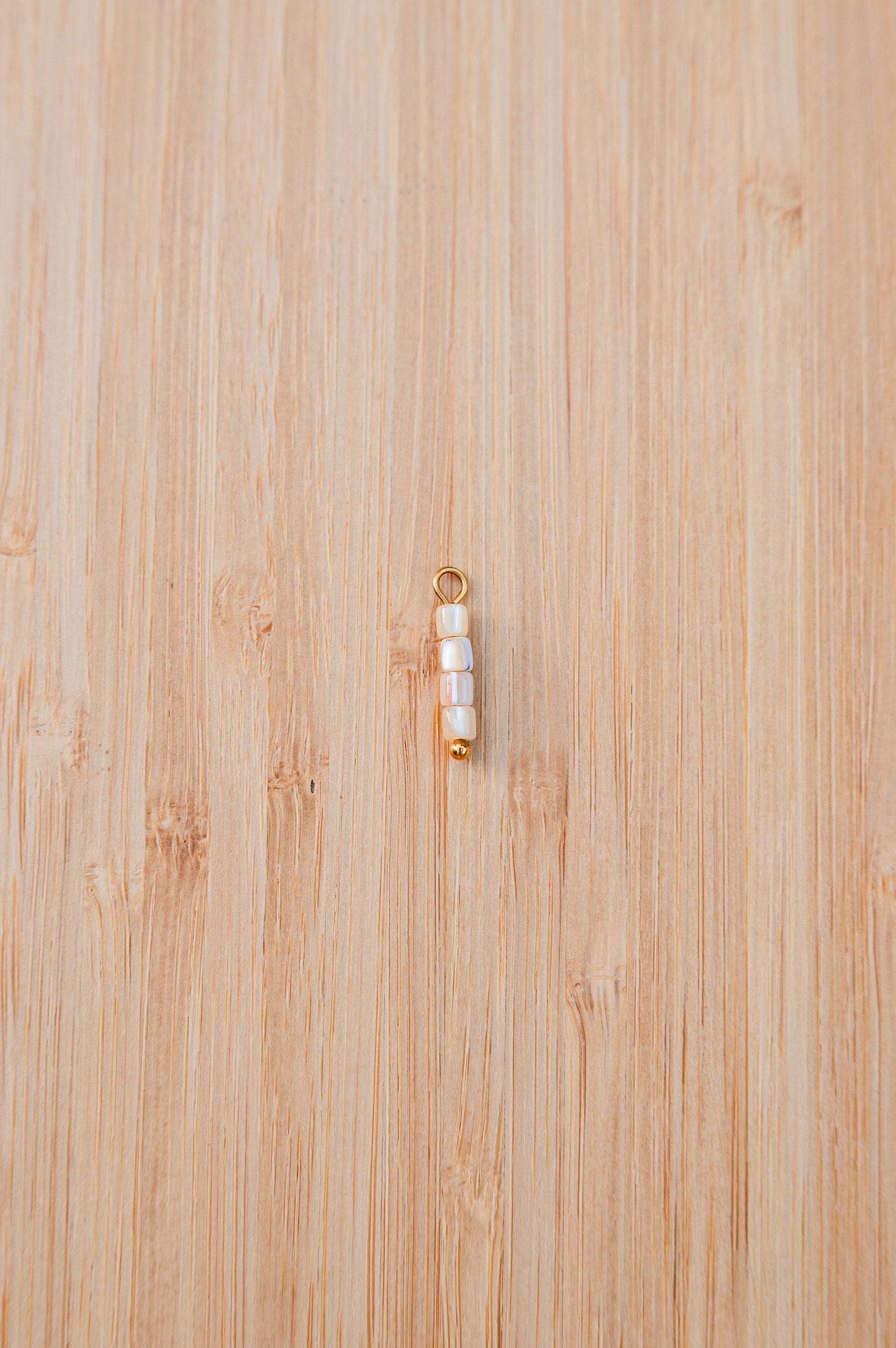 Oorbelhangers beige staafjes