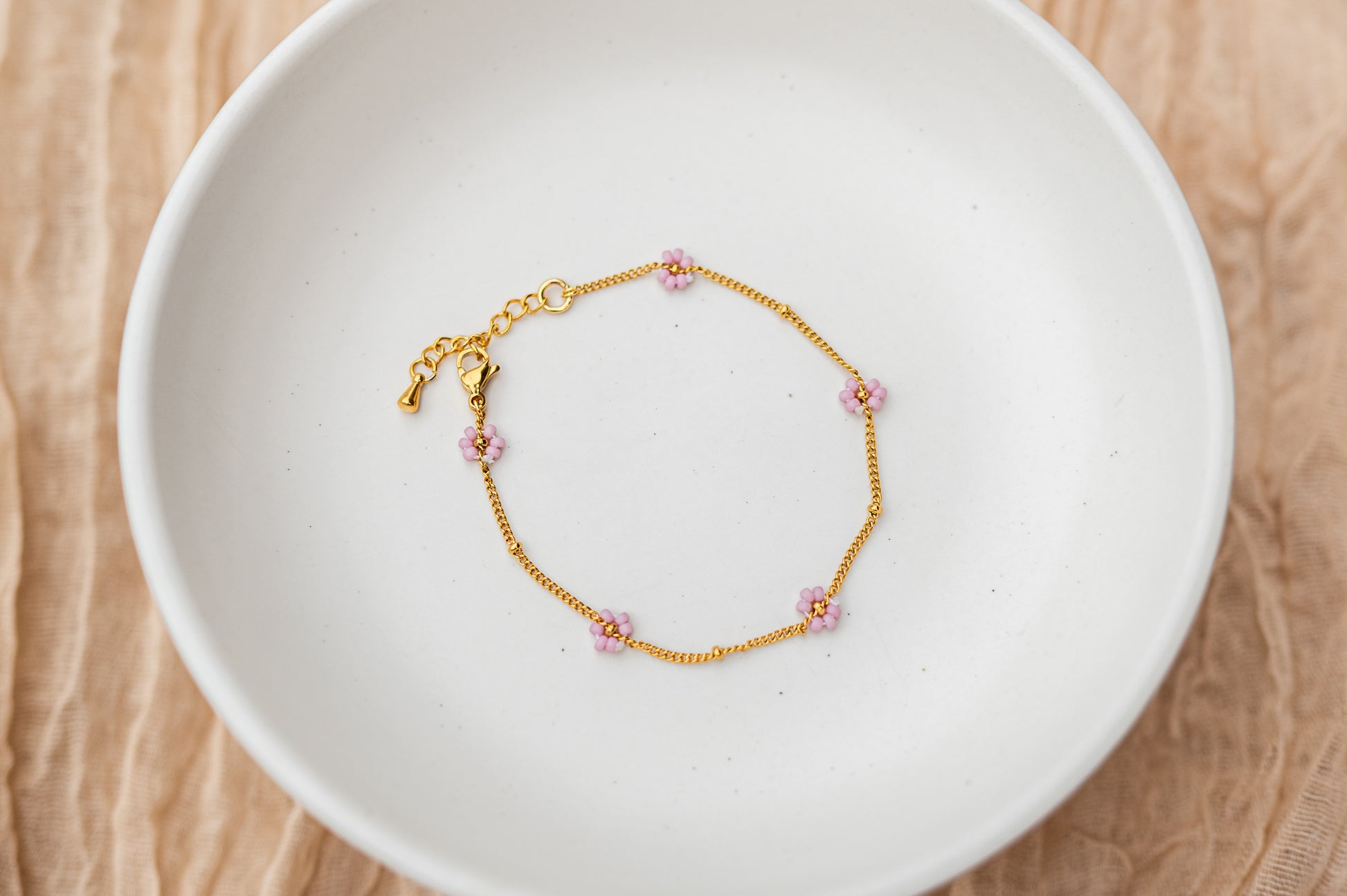 Bloemen armband goud - kleur