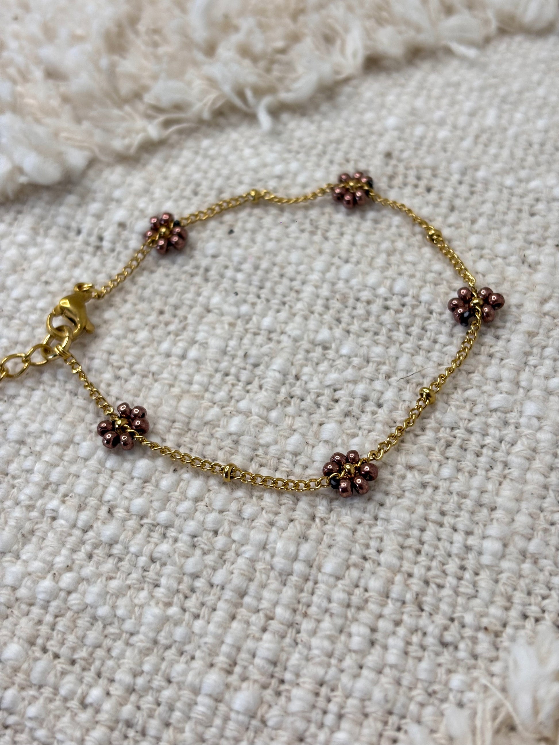 Bloemen armband goud - kleur